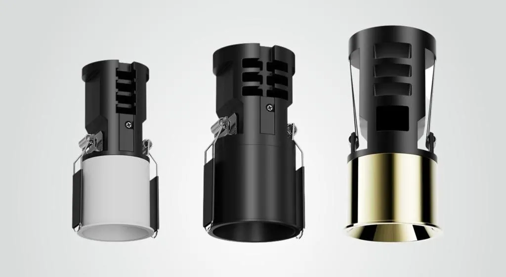 Three CAVA downlight modules in white, black and champagne finishes